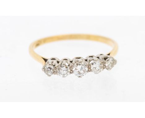 A diamond and 18ct gold five stone ring, comprising five round brilliant cut diamonds, diamond total approx 0.35ct, size R, c