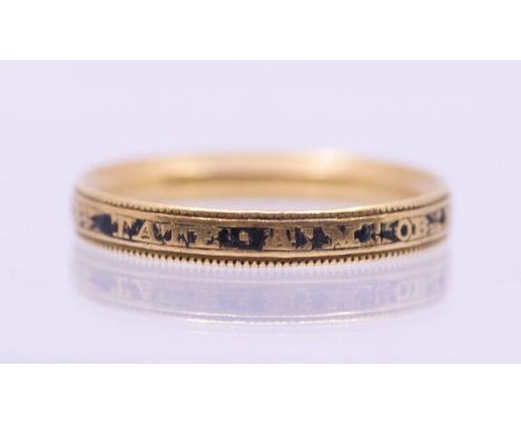 A George III yellow metal and enamel mourning ring, the band inscribed: " "Robt Tate AM OB 14 MAR 1769 AE 58". , the enamel h