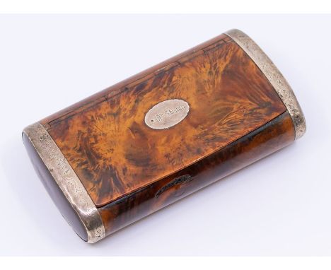 An early 19th Century silver bound maple table snuff box, oval form with engraved silver bindings, the cover inset with carto