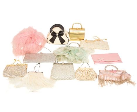 A collection of handbags and evening bags to include: a long gold bag by Stockley Trading Co with iridescent sequins and pear