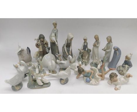 A large collection of Lladro and Nao figures of young ladies and animals