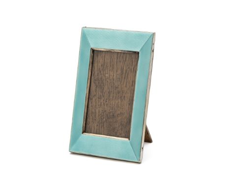 AN ENAMELLED SILVER PHOTOGRAPH FRAME, W.J. MYATT &amp; CO., BIRMINGHAM, 1929 rectangular, turquoise guilloché enamel, glazed,