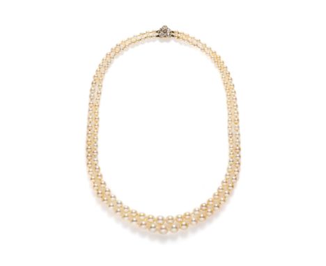 NATURAL PEARL AND DIAMOND NECKLACE composed of two graduated rows of pearls, measuring from approximately 7.8mm to 3.8mm, to 