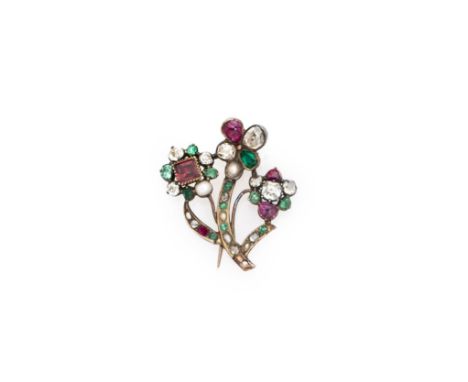 DIAMOND, EMERALD, RUBY AND SEED PEARL BROOCH, EARLY 19TH CENTURY designed as a spray of three flowers set throughout with clo