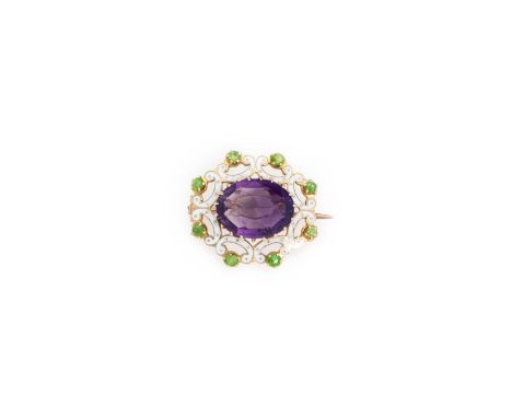 SUFFRAGETTE ENAMEL AND GEM-SET BROOCH, 1890S centring on an oval mixed-cut amethyst within a white enamel scroll frame accent