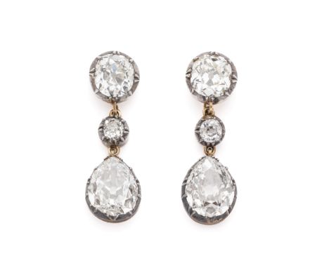 PAIR OF DIAMOND PENDENT EARRINGS, 1880S each composed of a cushion-shaped diamond surmount mounted in a cut-cown collet suppo