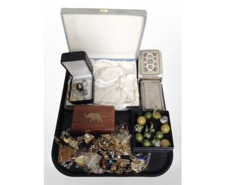 A collection of costume jewellery including gold-plated chains, dress rings, etc., together with several trinket boxes includ