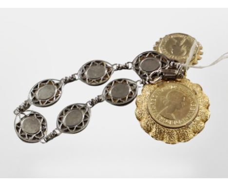 A silver three pence piece bracelet, further gilded coin pendants.