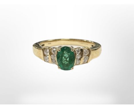 An 18ct gold emerald and diamond ring, size Q.  CONDITION REPORT: 5.5g