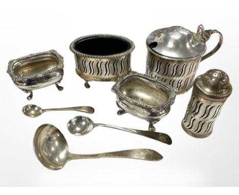 Two silver caddy spoons, together with a further EPNS spoon, a cruet set, and a pair of salts. CONDITION REPORT: Silver 28.5g