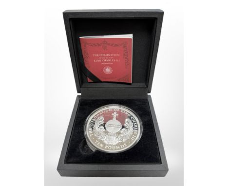 A £10 proof coin commemorating the Coronation of King Charles III 2023, issued by the Bradford Exchange and layered in pure s