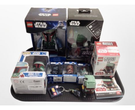 A group of Star Wars collectables including Brick Headz Boba Fett figure in box, Lego Star Wars Boba Fett alarm clock, Funko 
