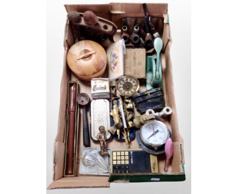 A box of assorted collectables, including pipes on pipe racks, a safety razor, recorder, an auctioneer's gavel, mother of pea