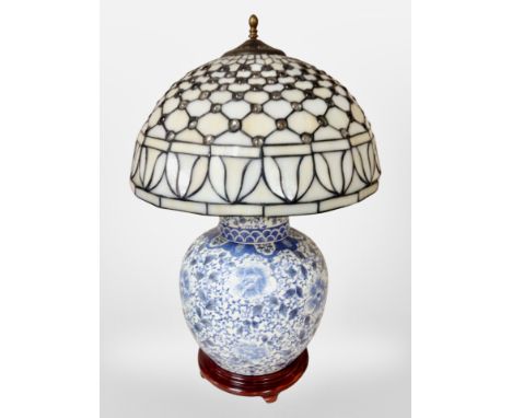 A 20th century Chinese porcelain blue and white ginger jar converted to a table lamp, with Tiffany style mushroom shade, heig