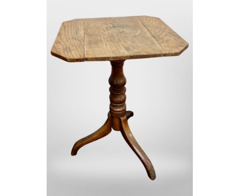 An Edwardian oak tripod occasional table, height 76 cm 