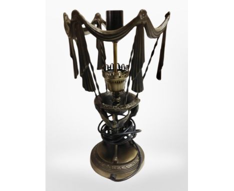 A contemporary patinated metal table lamp, height 41cm.