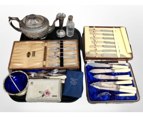 A group of boxed and unboxed cutlery, a silver-plated vase, 19th century teapot, decimal coin set., etc.