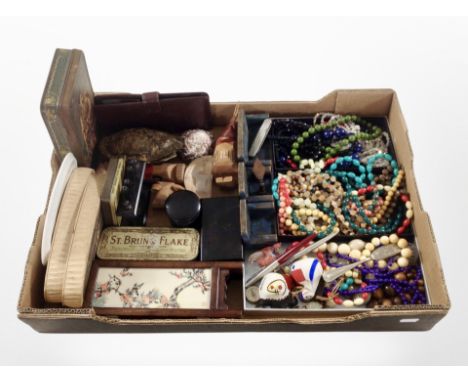 A box of assorted collectables, including costume bead necklaces, writing utensils, pocket knife, vintage tins, miniature ori