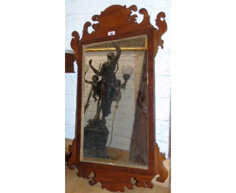 An Early 20th Century Mahogany Wall Mirror with shaped surround. €80-120