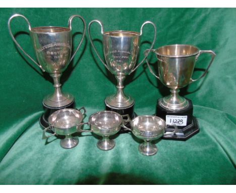 Silver: Six Twin Handled Trophy Cups. €80-120