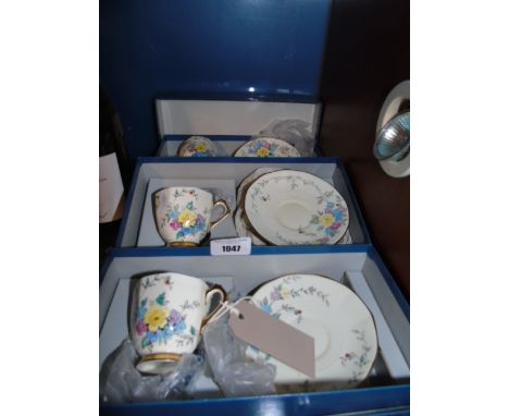 Three Boxed Tuscan China Cups and Saucers. €40-60