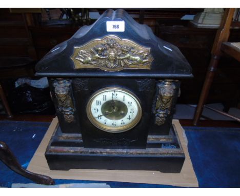 A Gilt Metal Mounted Victorian Slate and Marble Mantel Clock, 52cm high, 48cm wide, (no key or pendulum). €100-200