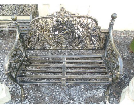 A Cast Iron Garden Bench, with plaque depicting a reclining lady to back. €500-800