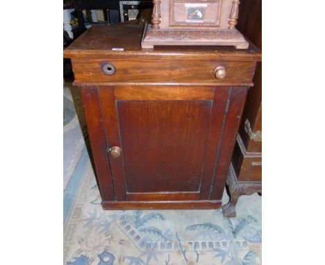 A 19th Century Mahogany Commode with lift-up lid, the top 42 x 69 and 87cm high. €20-40