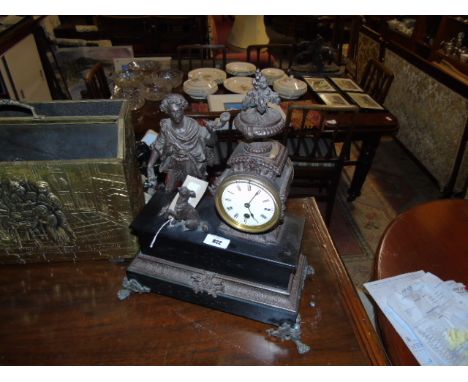 19th Century French Black Slate and Bronzed Spelter Cased Mantel Clock, the case surmounted with a figure of a young boy with