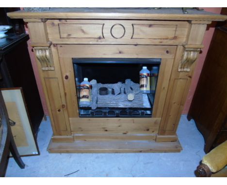 A Pine Fire Surround and Insert for Gel Fire, including 2 bottles of gel. €100-200