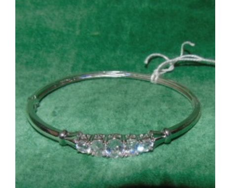 A Silver Set Stone Bangle. €30-50