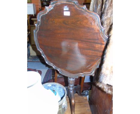 A 19th Century Mahogany Tilt-Top Occasional Table, with pie crust edge and tripod base. €200-300