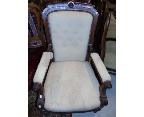 A Late Victorian Mahogany Framed Upholstered Armchair, with button-back upholstery. €100-150