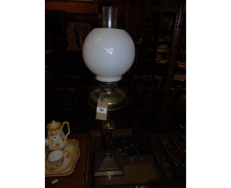 Early 20th Century Oil Lamp having brass reservoir on a brass barley twist column, and opaque glass shade. €80-120
