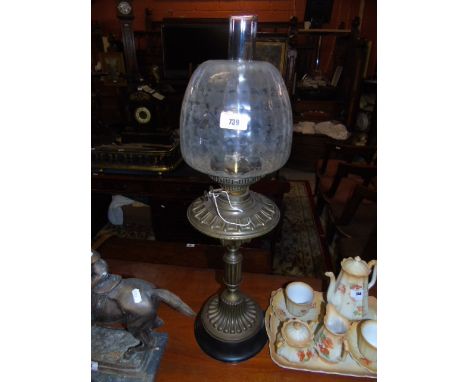 A Brass Oil Lamp with a glass shade €80-100