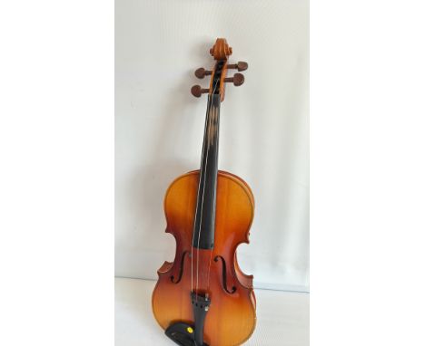 Antique violin with flamed maple back, ebony fingerboard, and fine grain spruce top.