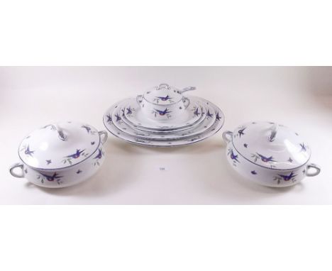 A Cartwright and Edwards dinner service decorated 'Blue Birds' comprising: nine dinner plates, five meat plates, two tureens,