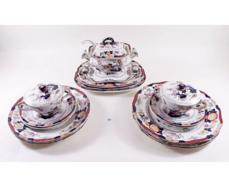 A Masons patent ironstone part dinner service comprising: two sauce tureens, stands and ladles, three small meat plates, four