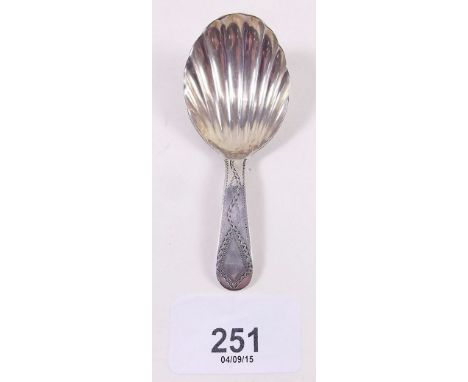 A silver shell bowl caddy spoon with engraved decoration to handle, London 1834, by George Smiths & Thomas Hayter