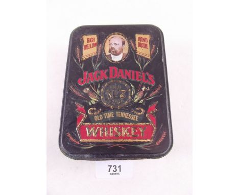 Two miniature bottles of Jack Daniels 'Tennessee sipping whiskey' in tin 
