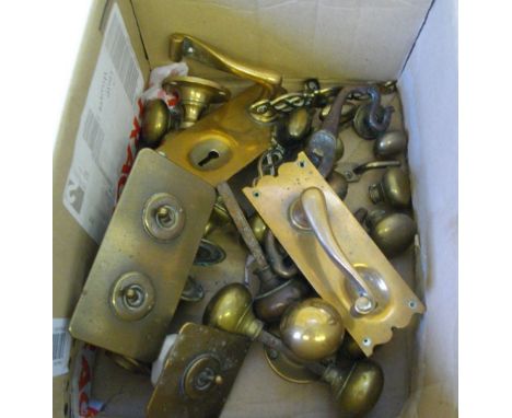 A  box of brass door handles, light switch etc.