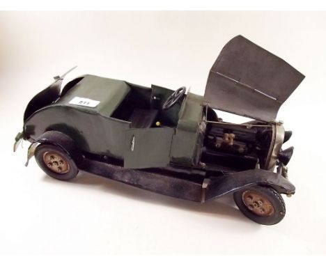 An early 20th century large scale green tin plate vintage car, 40cm - with Michelin tyres 