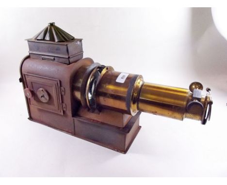 An old magic lantern in tin box 