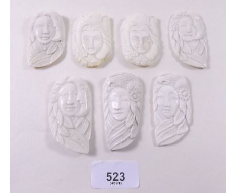 A set of seven oriental early 20th century ivory portrait panels of women