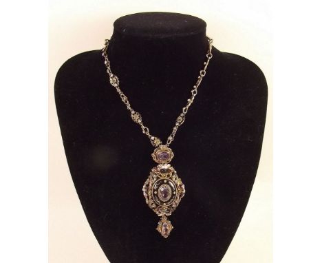 A 19th century continental large decorative silver pendant necklace set amethysts with enamel floral decoration 