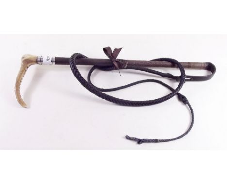 An early 20th century silver mounted hunting crop with marked silver button on hilt for Swaine & Adeney of London with horn h
