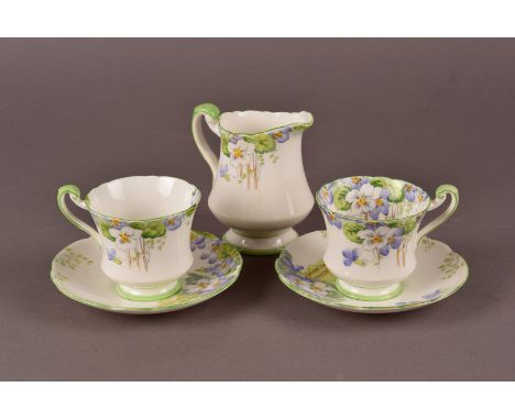 A pretty Art Deco period Royal Paragon porcelain part tea set, comprising six cups and saucers and milk jug, marked Replica O