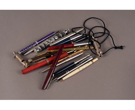 A Collection of vintage pens, including examples by Roll-tip, Parker, Paper-mate and Burnham together with whistles, training