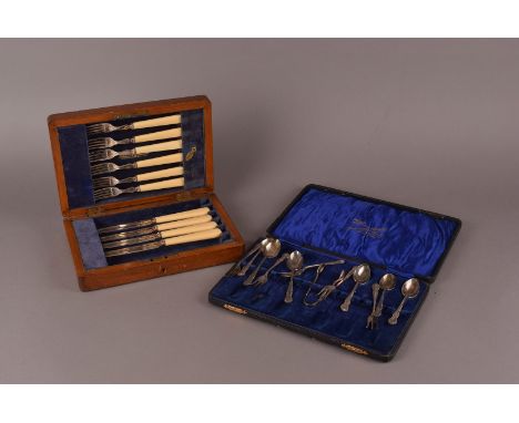 A collection of silver and silver plated items, to include a cased part set of silver knives and forks, salt and peppers, ton