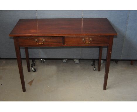 An Edwardian period or later mahogany console table, having two frieze drawers  